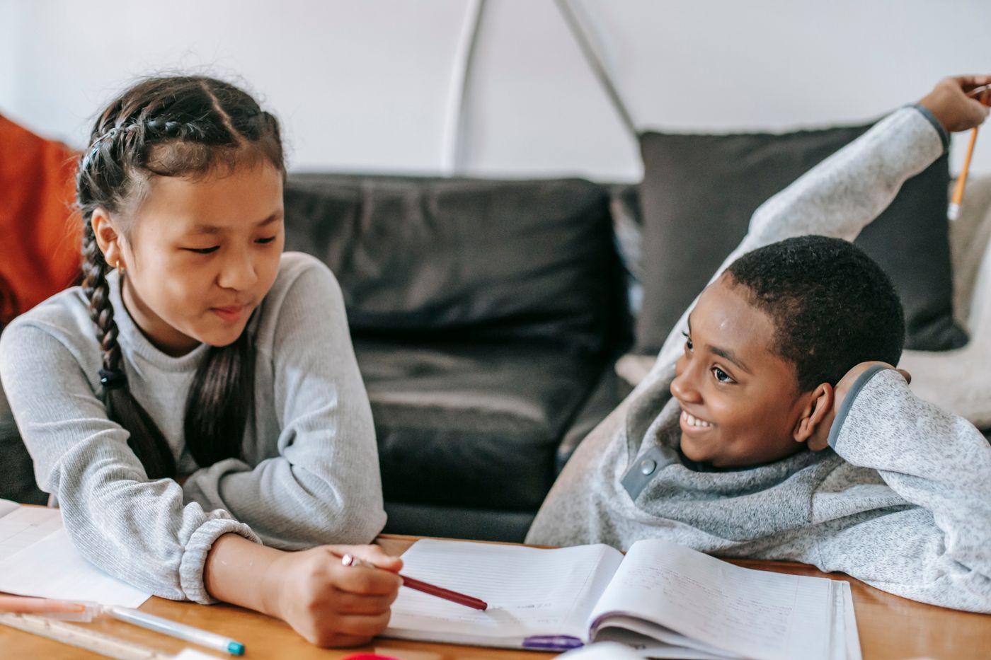 Two children collaborating on learning activities